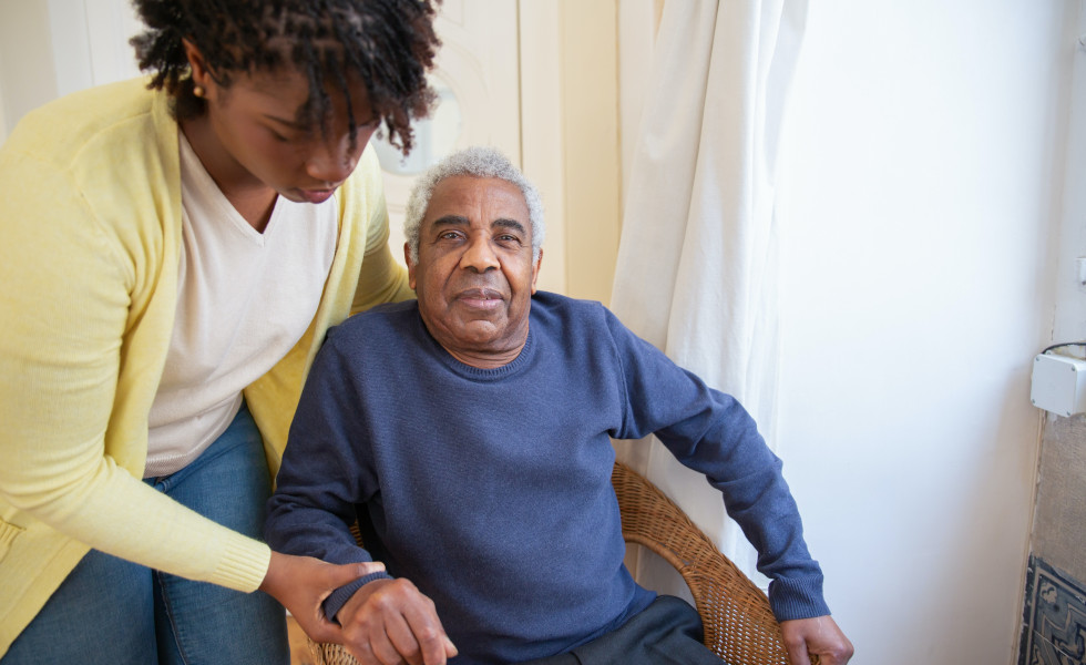 senior getting assistance with dementia care