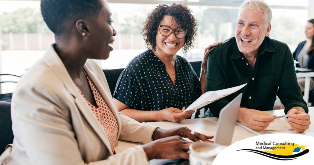 A couple talks with and advisor, representing the type of preparation that is crucial for successful senior care planning.