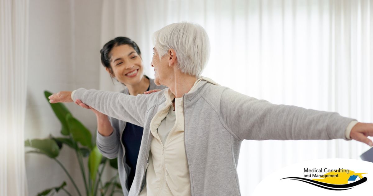 A caregiver and senior practice tai chi as one of many enriching activities for seniors at home.