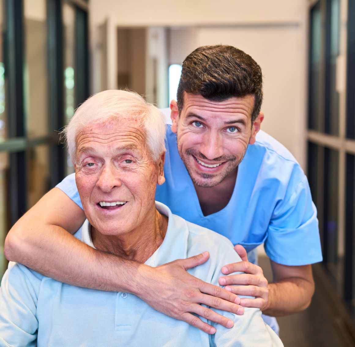 Companionship Care in Rockville, Maryland – Caregiver Supporting Senior Caregiver providing companionship care to a smiling senior man in Rockville, Maryland.