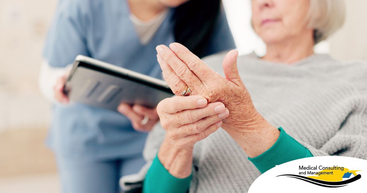 A caregiver provides in home care services to a senior with arthritis