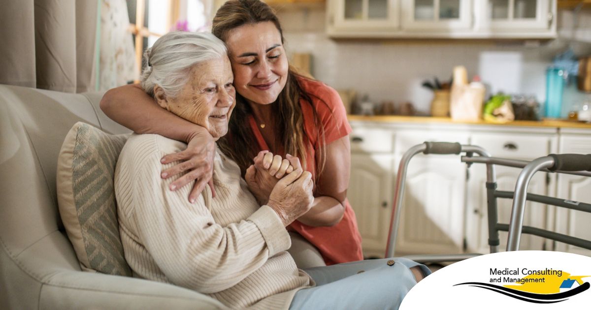 Caregiver supporting an elderly woman in the transition to senior home care